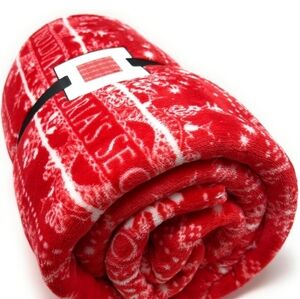 New Victoria's Secret soft sherpa blanket in a red and white snowflake pattern. 